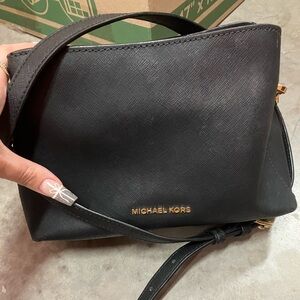 Michael Kors purse. Look at photos for marks and whatnot